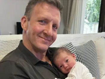 Will Sonbuchner with his daughter (Source: YouTube)